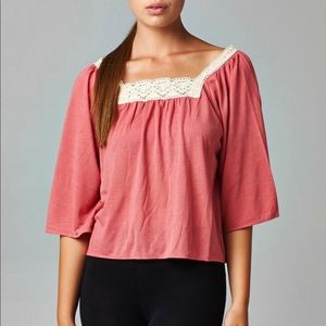 Women’s square neck lace top in a pinky mauve.